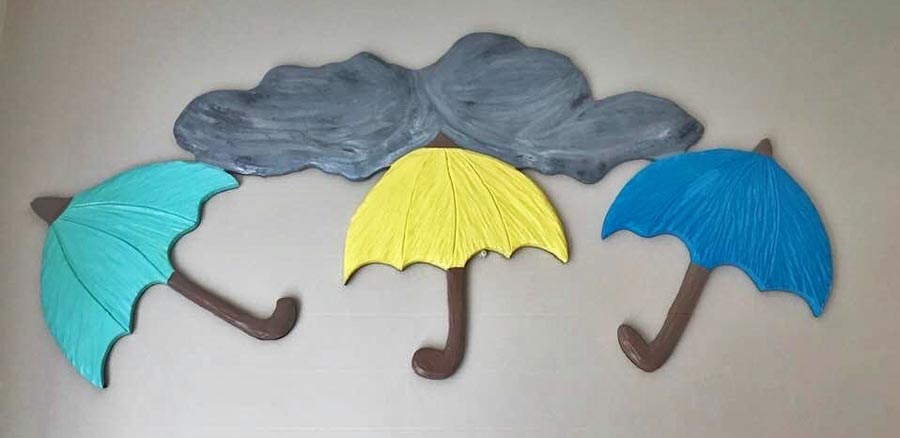 wood carved umbrella with rain cloud, by Vancouver Island wood carver West Coast Wood Creations
