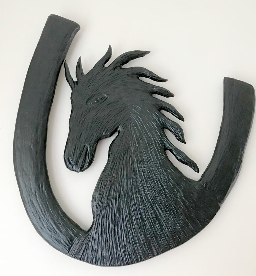 Vancouver Island wood carving of horse head with horseshoe by WCW