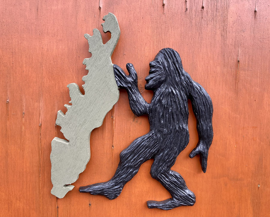 Sasquatch with Vancouver Island silhouette, wooden artwork by Vancouver Island Woodworker Kim Reavley